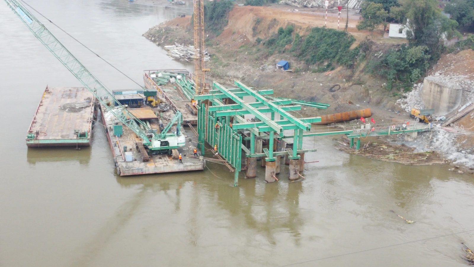 At the Construction Site of the New Phong Chau Bridge