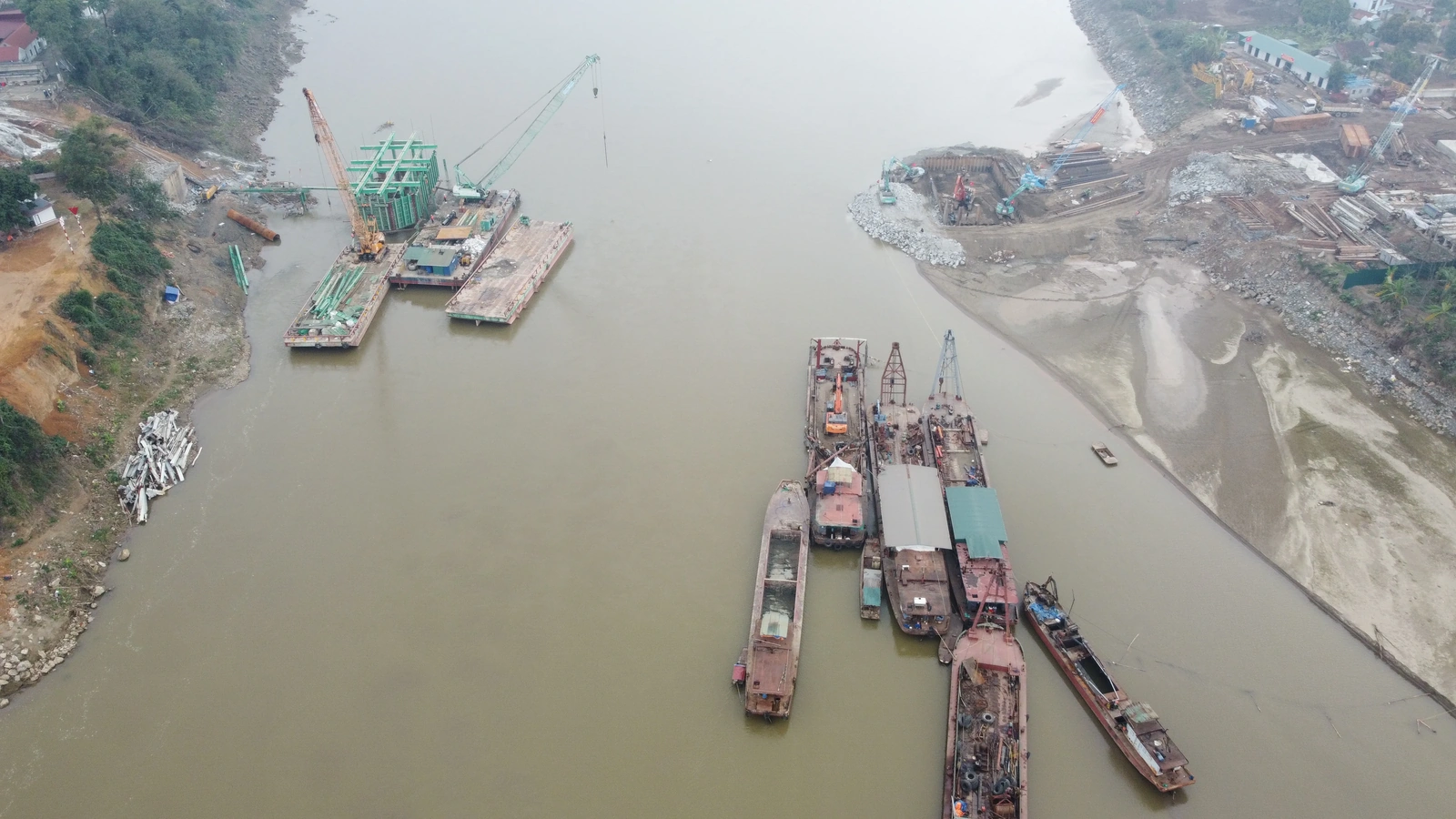 At the Construction Site of the New Phong Chau Bridge