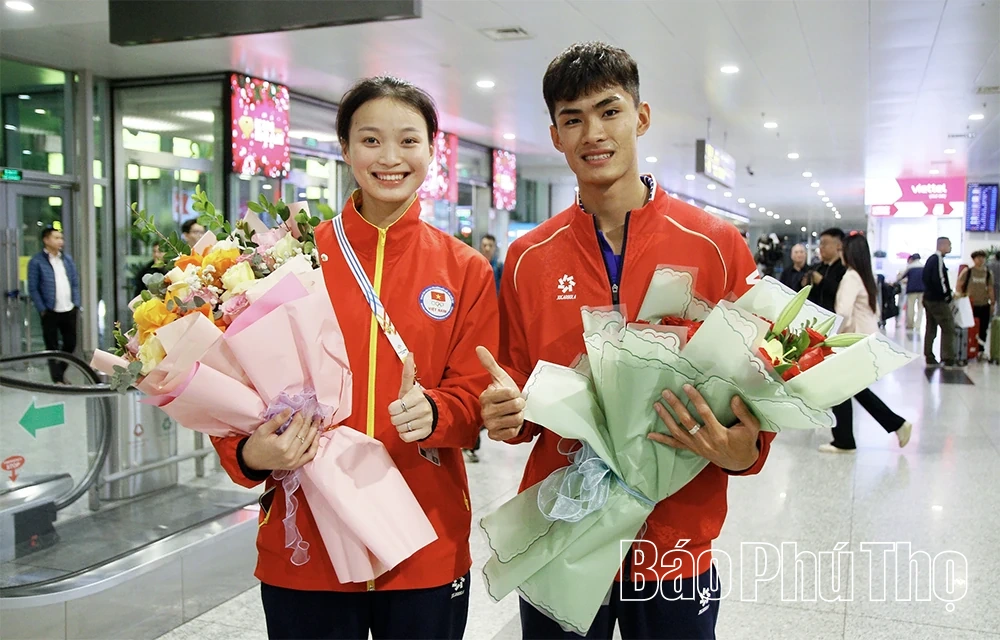 Đón “cặp đôi vàng” của thể thao Đất Tổ trở về từ SEA Games 33