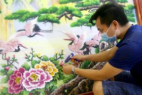 Làm tranh từ đá