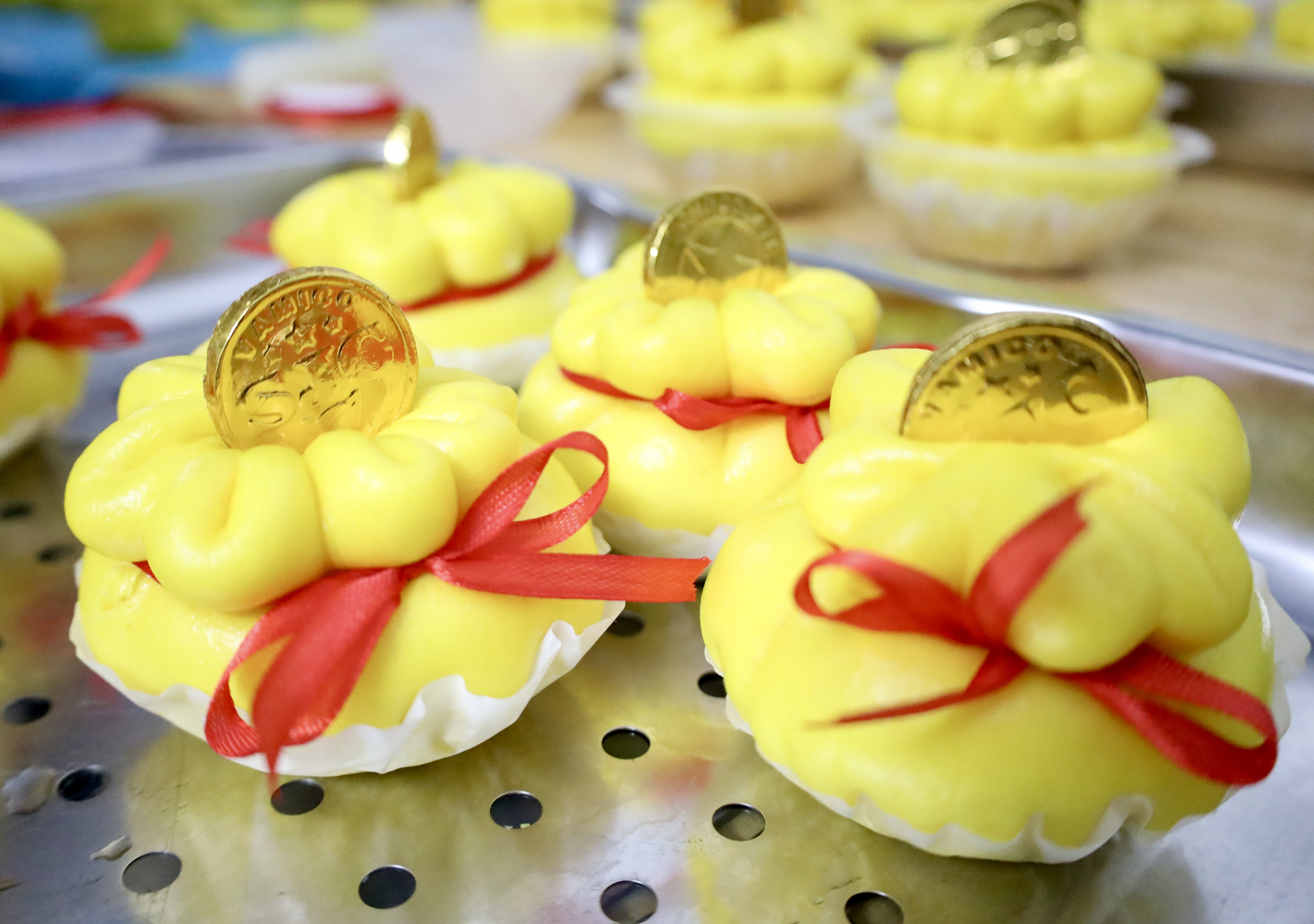 Diverse cake offerings for God of Wealth day