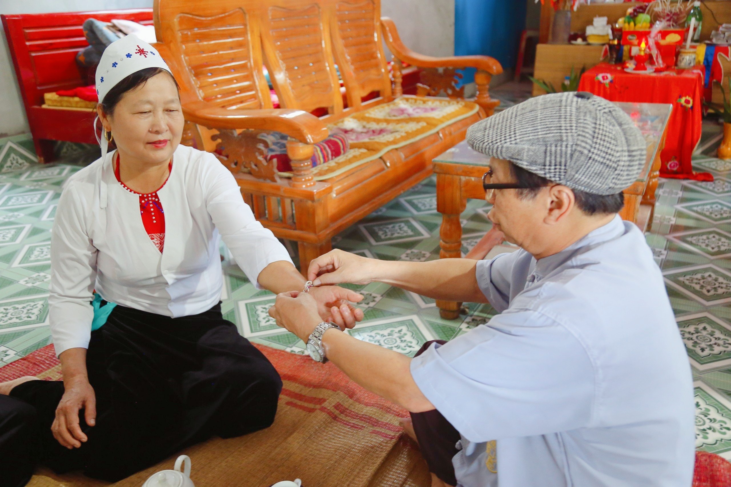 The Muong peoples thread tying around their wrists rituals