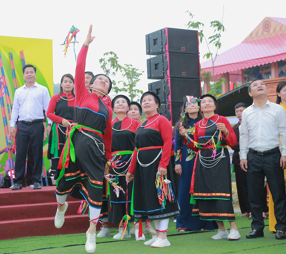 Performing traditional folk games during the Hung King Temple Festival