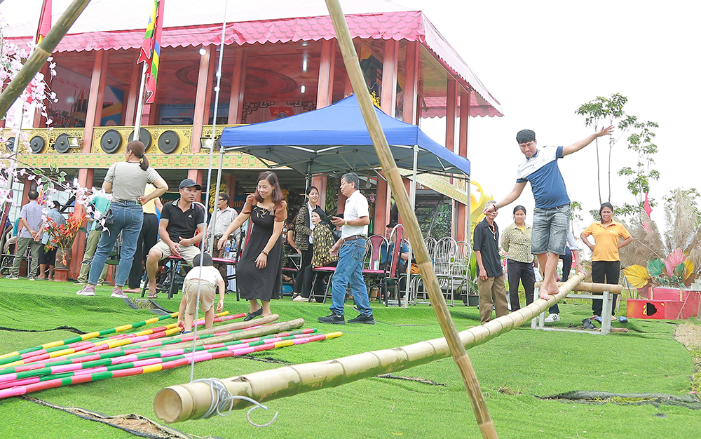 Performing traditional folk games during the Hung King Temple Festival