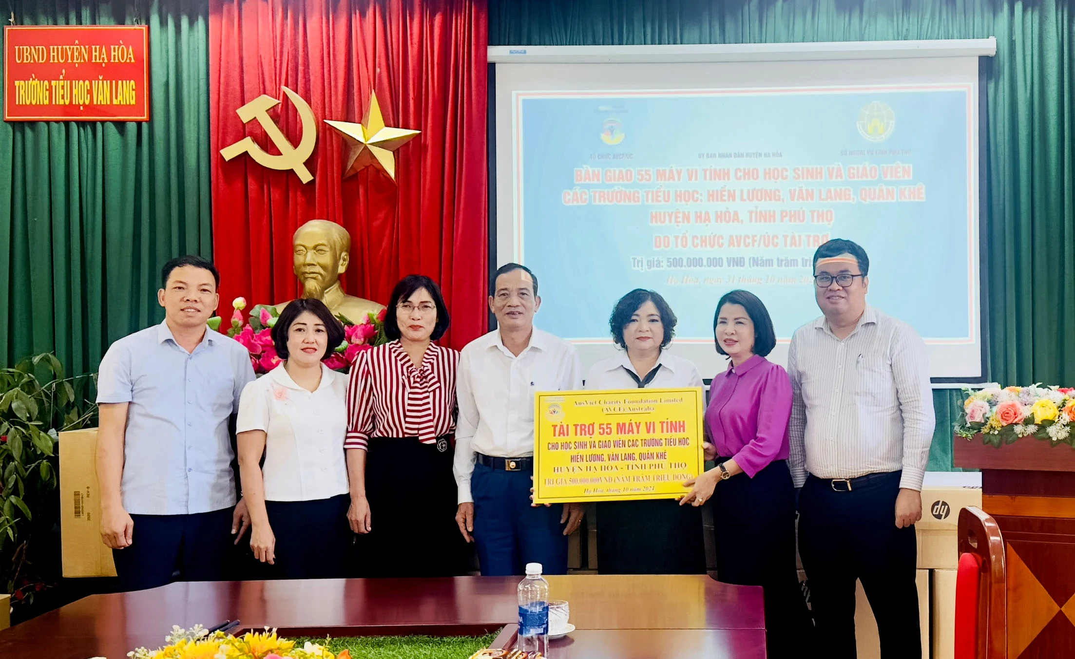 Handing over 55 computers sponsored by AVCF to the education sector in Ha Hoa