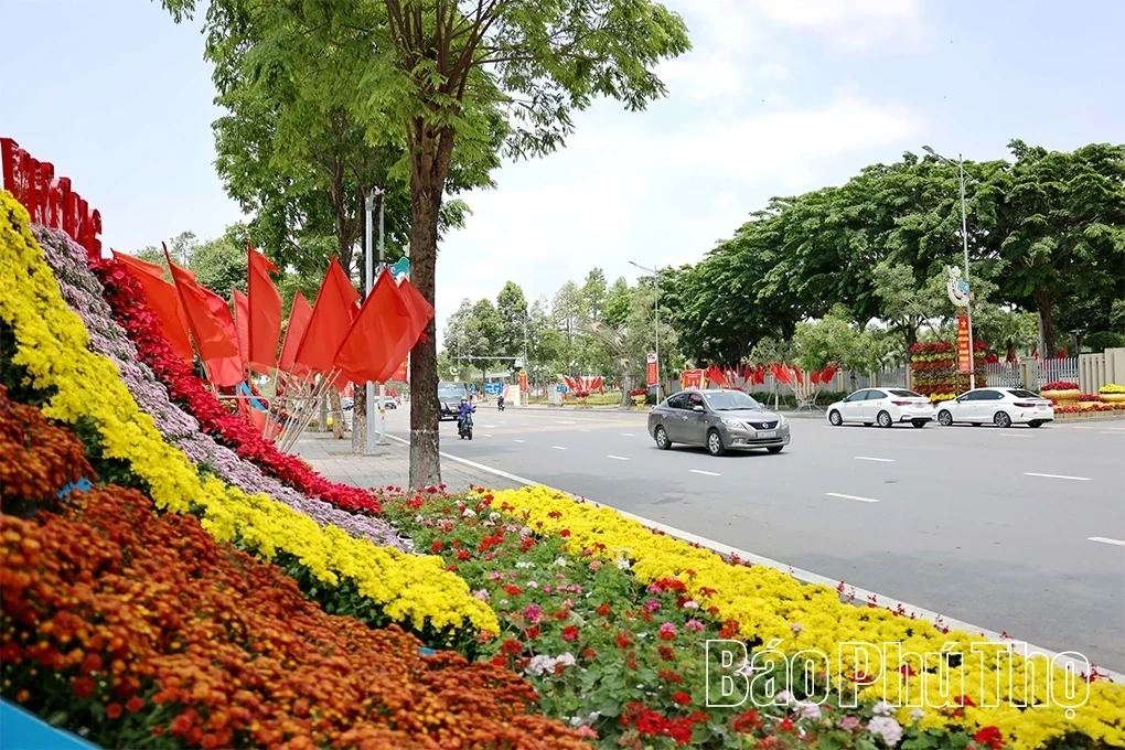 A Vibrant Display of Flags and Flowers to Celebrate April 30 and May 1