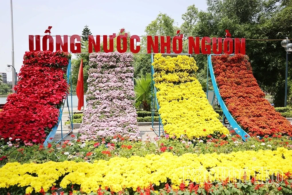 A Vibrant Display of Flags and Flowers to Celebrate April 30 and May 1