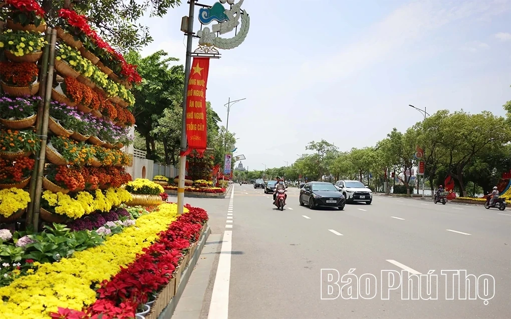 A Vibrant Display of Flags and Flowers to Celebrate April 30 and May 1