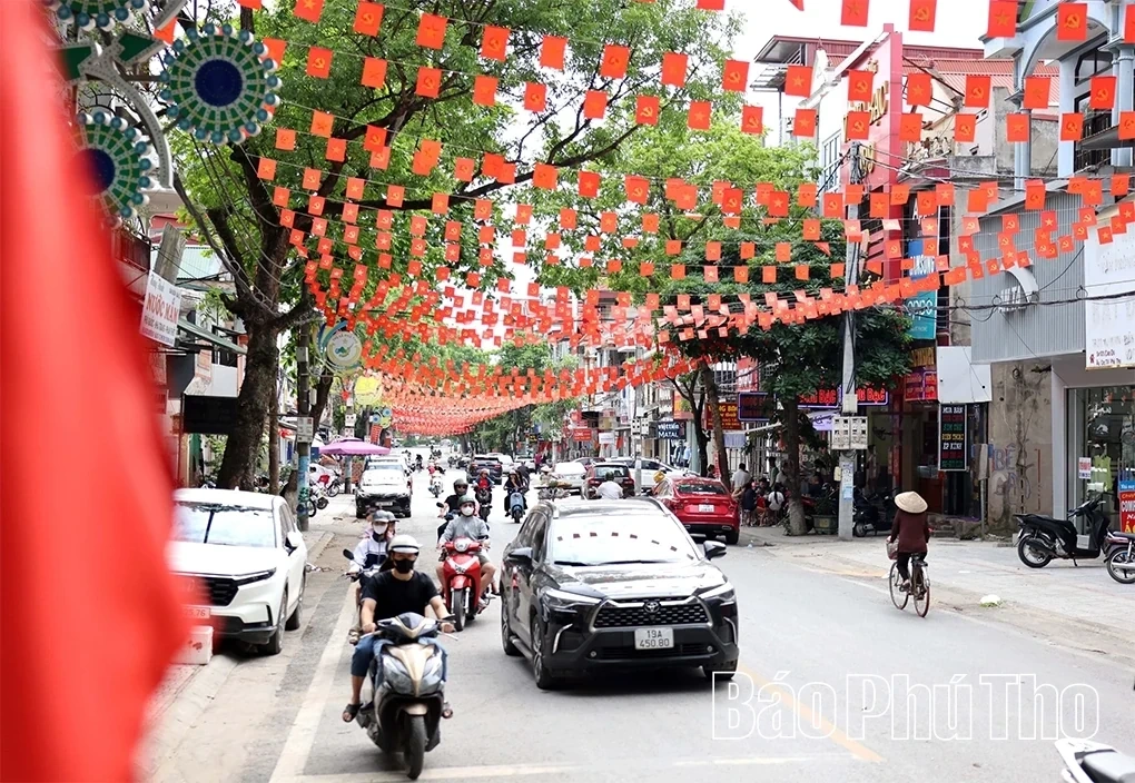 A Vibrant Display of Flags and Flowers to Celebrate April 30 and May 1