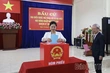 Deputy Secretary of the Provincial Party Committee and Chairwoman of the Provincial Fatherland Front Committee Bui Thi Minh Attends Opening Ceremony and Casts Vote in Hoa Binh Ward