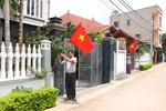 Cờ Tổ quốc trong mỗi nếp nhà