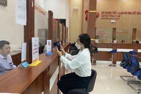 Đẩy mạnh thanh toán không dùng tiền mặt trong dịch vụ công