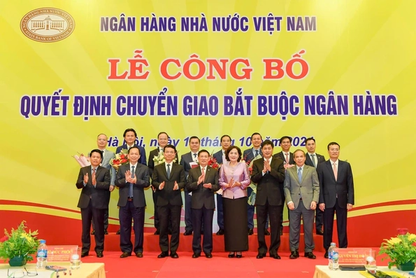 Ngân hàng Nhà nước công bố chuyển giao bắt buộc CB cho VCB và Oceanbank cho MB