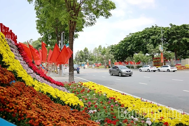 A Vibrant Display of Flags and Flowers to Celebrate April 30 and May 1